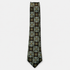 The Asti Tie – black, teal and ivory floral medallion silk tie on a light grey background