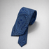 Blue tonal paisley silk necktie on a grey background.