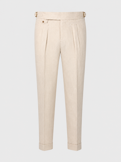 Byron sand pleated trousers with side adjusters and cuffed hems.