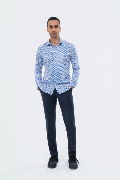Male model wearing a light blue geometric-print shirt with navy trousers.