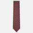 The Pavia Tie – burgundy and ivory micro rosette silk tie on a light grey background