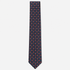 The Spoleto Tie – navy, red and pale blue dot medallion silk tie on a light grey background
