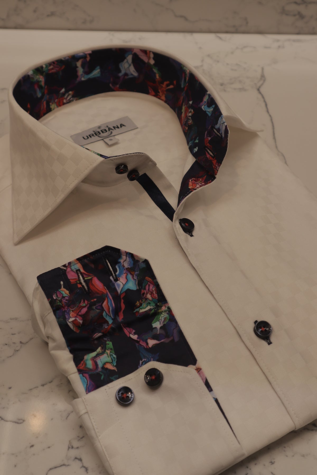 URBBANA white shirt with geometric jacquard texture.