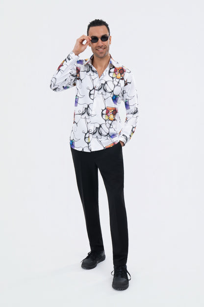 Male model wearing a white illustrated-print shirt with black trousers.